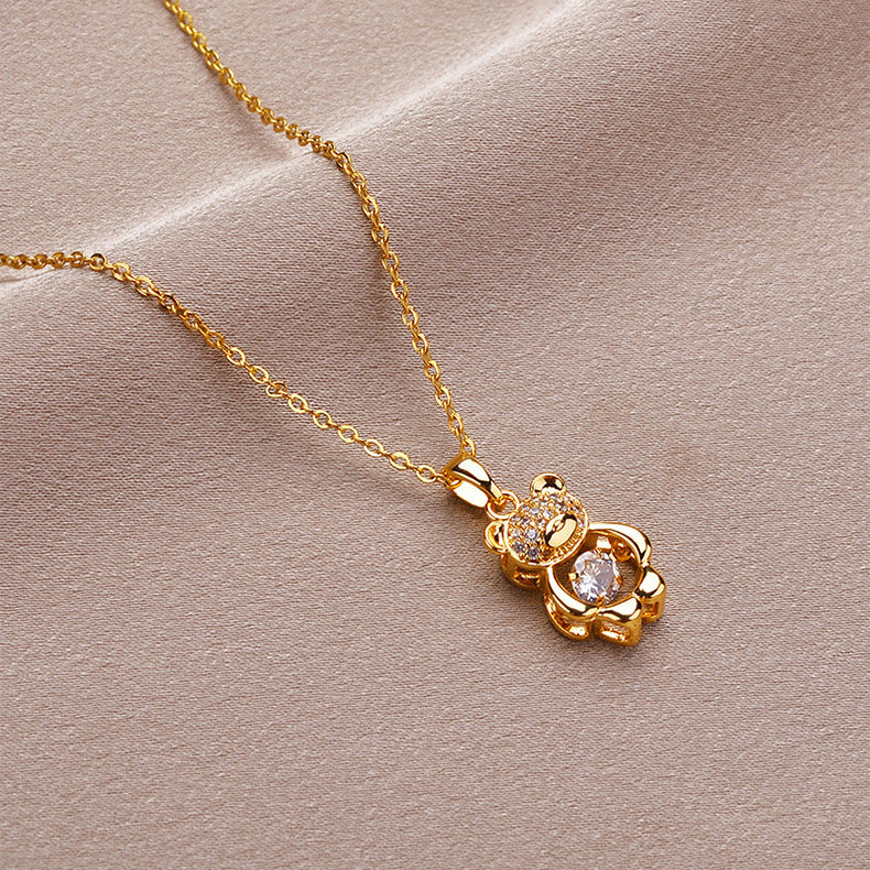 Collana con ciondolo a orsetto carino per donna in acciaio al titanio placcato oro con catena a maglie lunghe e design floreale irregolare