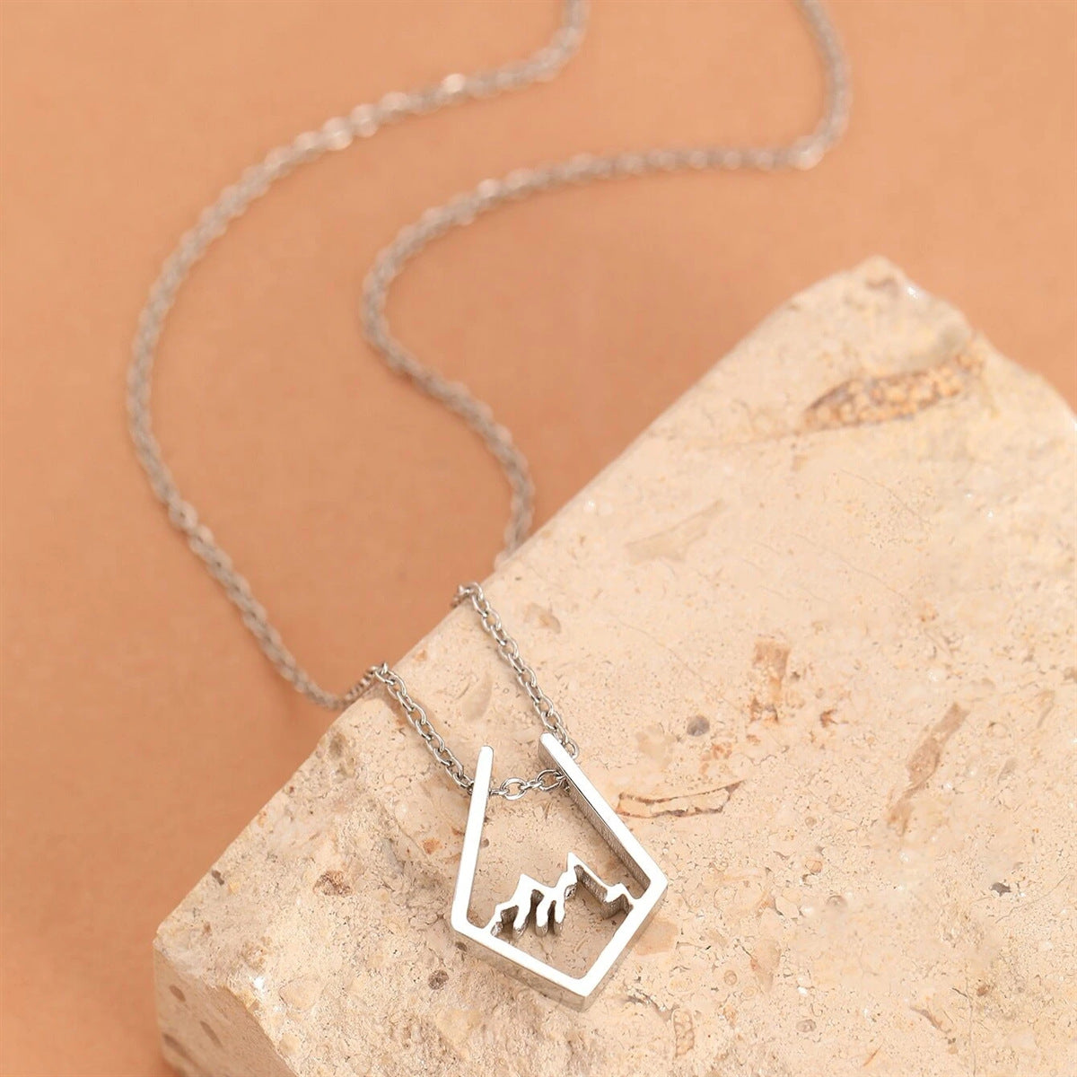 Natural Style Geometric Hollow Mountain Silhouette Pendant Necklace in Titanium Steel with Plated Finish on Pearl Chain for Everyday Wear and Holiday Gifting