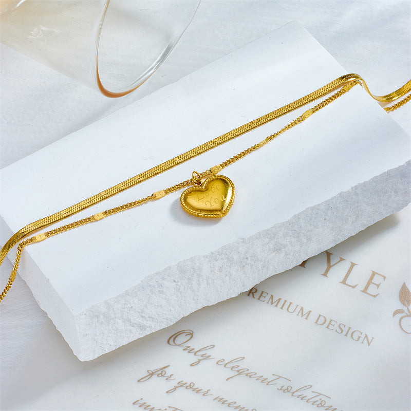 Cavigliera minimalista vintage a doppio strato in acciaio al titanio a forma di cuore con lettere incise
