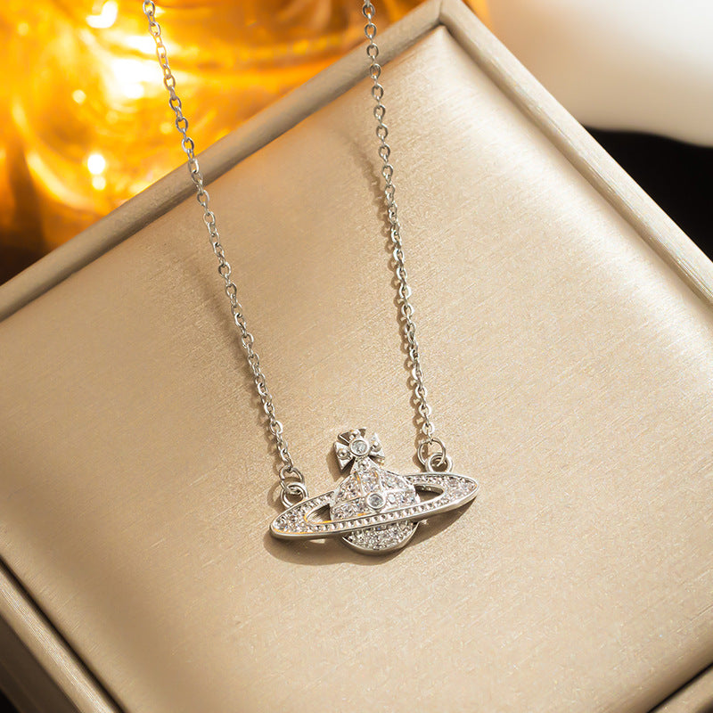 Fashion-Forward Geometric Saturn Pendant Necklace in Titanium Steel with Rhinestone Inlay and Electroplated Finish for Women