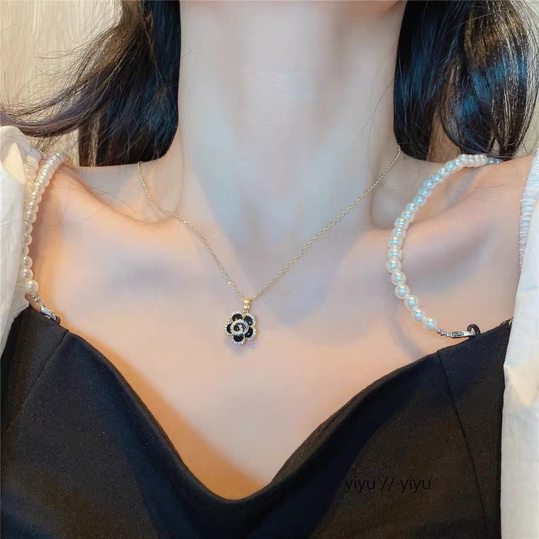 Elegant Camellia-Shaped Pendant Necklace in Titanium Steel with Gold Plating and Zircon Accents for Women