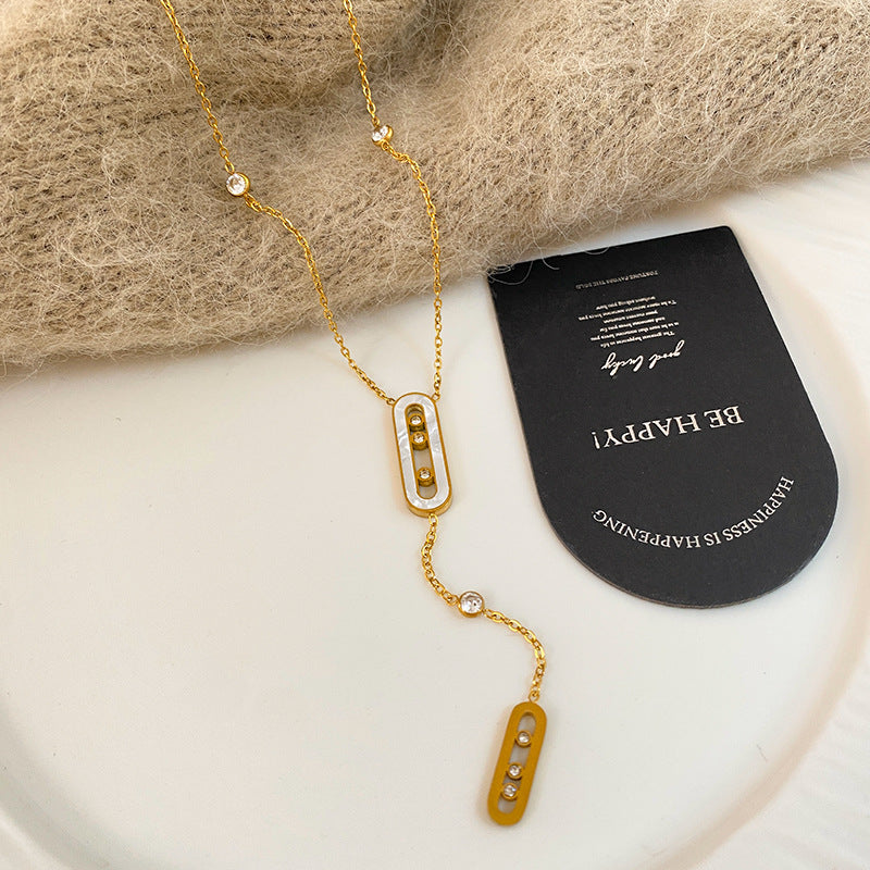 Minimalist Geometric Titanium Steel Necklace with Gold Plating, Micro-set Diamond and Shell Tassel
