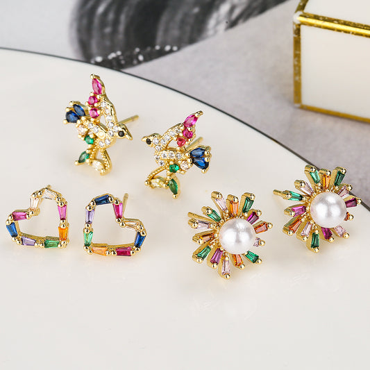 Aretes minimalistas geométricos de pájaro, flor y corazón para mujer en cobre con baño de oro real e incrustaciones de circonitas
