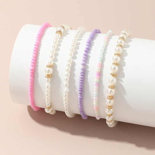 Set di bracciali di perline in vetro geometriche minimaliste per ragazze nei colori pastello rosa e viola