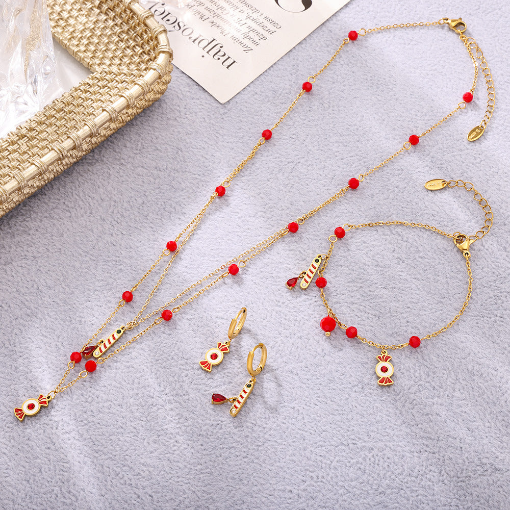 Collana con pendente a forma di caramella a ruota panoramica di lusso con catena in acciaio inossidabile, strass e accenti di granato, dettagli in smalto, da donna