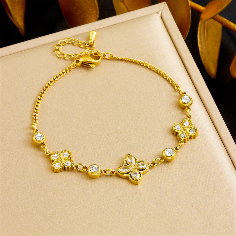 Elegant Rhinestone Inlaid Four-Petal Flower Tassel Stainless Steel Jewelry Set for Women
