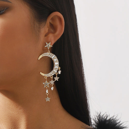 Pendientes de mujer con colgante geométrico de luna y estrella, dulces y atrevidos, con base de aleación e incrustaciones de diamantes de imitación, acabado chapado y diseño de borla larga
