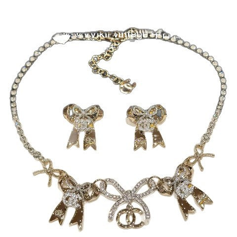 Collana da donna lusso elegante placcata oro con fiocco in ottone e strass