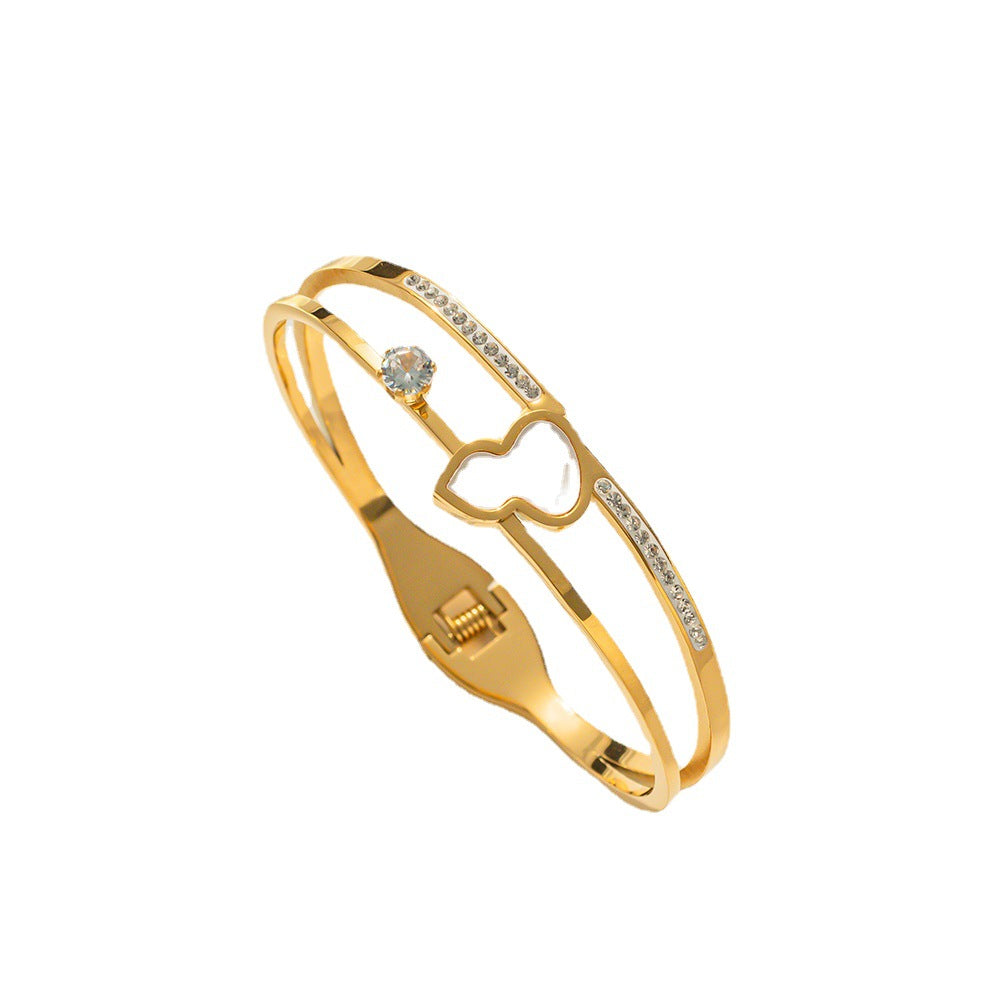 Bracciale minimalista "Zucca fortunata" da donna in acciaio al titanio placcato oro 18K con intarsio in madreperla