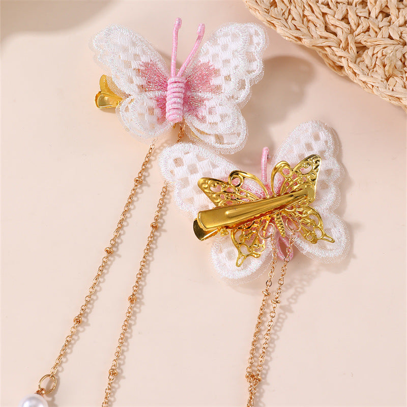 Fermaglio per capelli con fiocco a farfalla in stile naturale per bambini, con materiale in resina e dettaglio catena con nappina