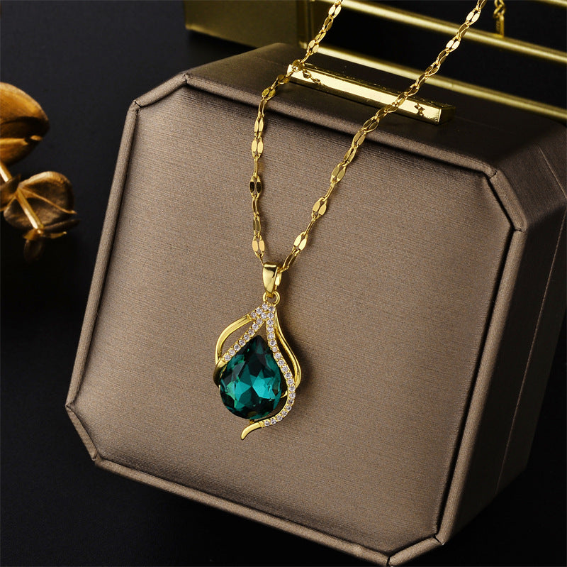 Collana in Acciaio al Titanio a Goccia Stile Naturale con Intarsi di Cristallo e Motivo a Concha