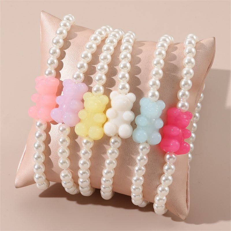 Braccialetto per bambini con ciondolo a orsetto in resina minimalista, design con perline fatte a mano e estetica fresca