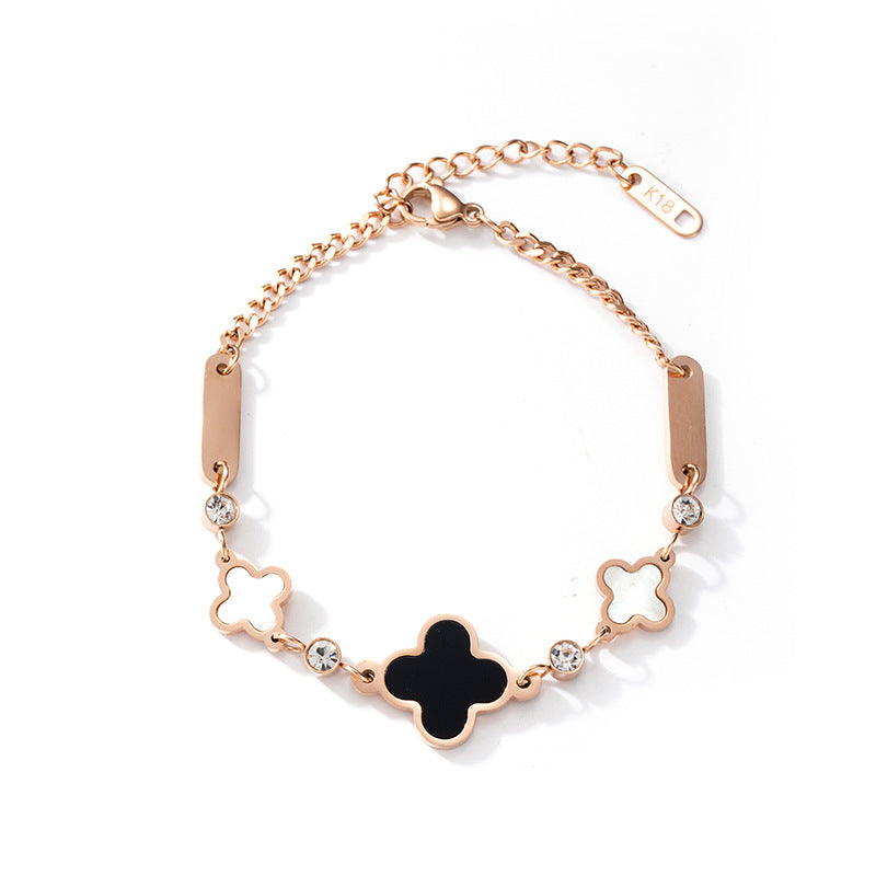 Pulsera geométrica de trébol de cuatro hojas de acero titanio con baño de oro rosa de 18K para mujer