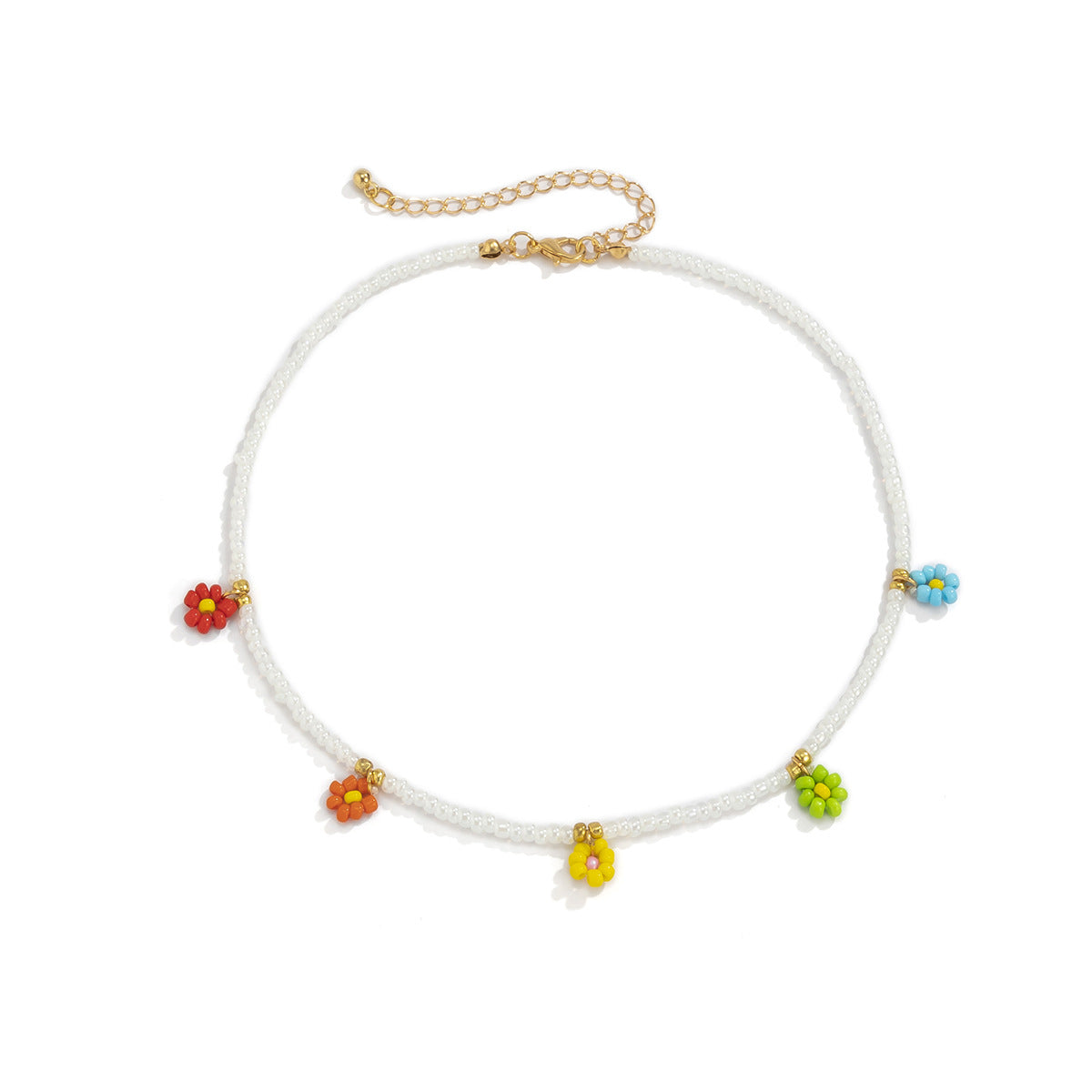 Collana pendente margherita minimalista con dettaglio nappa da donna, con accenti in resina e perline, design floreale rotondo su catena a sfere