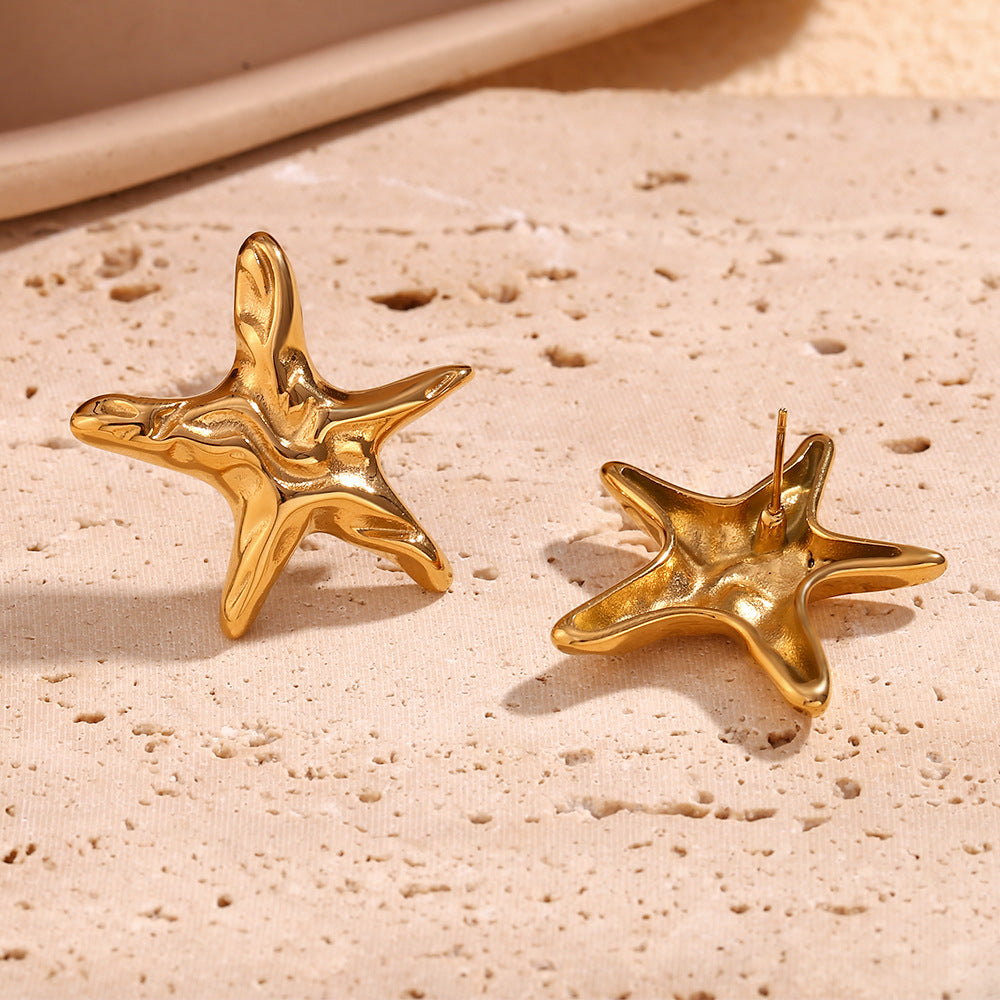 Orecchini a perno da donna a forma di stella in acciaio inossidabile, ispirazione vintage con texture irregolare