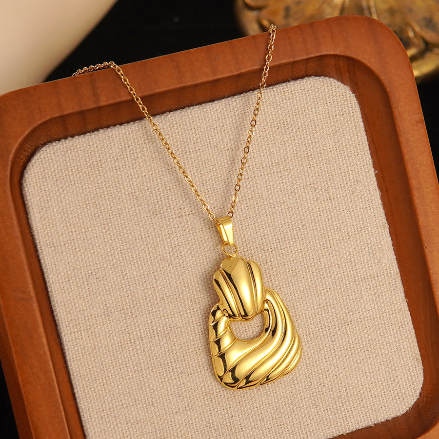 Conjunto de joyas de acero inoxidable con baño de oro minimalista con colgante de corazón floral y lazo en cadena para mujer