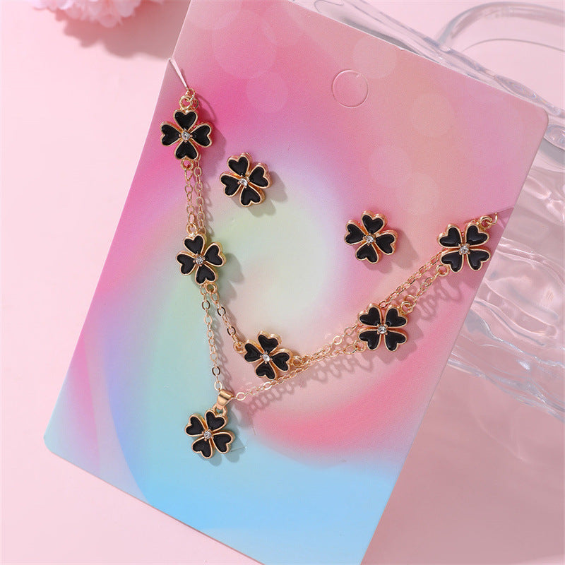 Minimalist Bowknot Resin Necklace Set for Girls with Matching Bracelet and Stud Earrings Featuring Enamel Finish