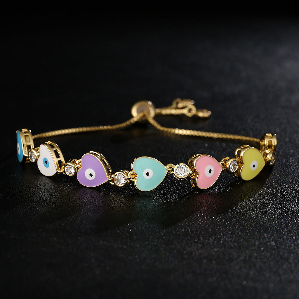 Bracciale in Rame Geometrico Stile INS Carino con Placcatura in Oro 18K, Zirconi Micro-Incastonati, Ciondolo Occhio a Cuore in Smalto per Donna