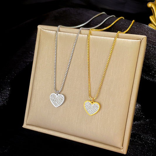 Collar con colgante de corazón de acero de titanio de lujo minimalista para mujer con baño de oro y diseño geométrico