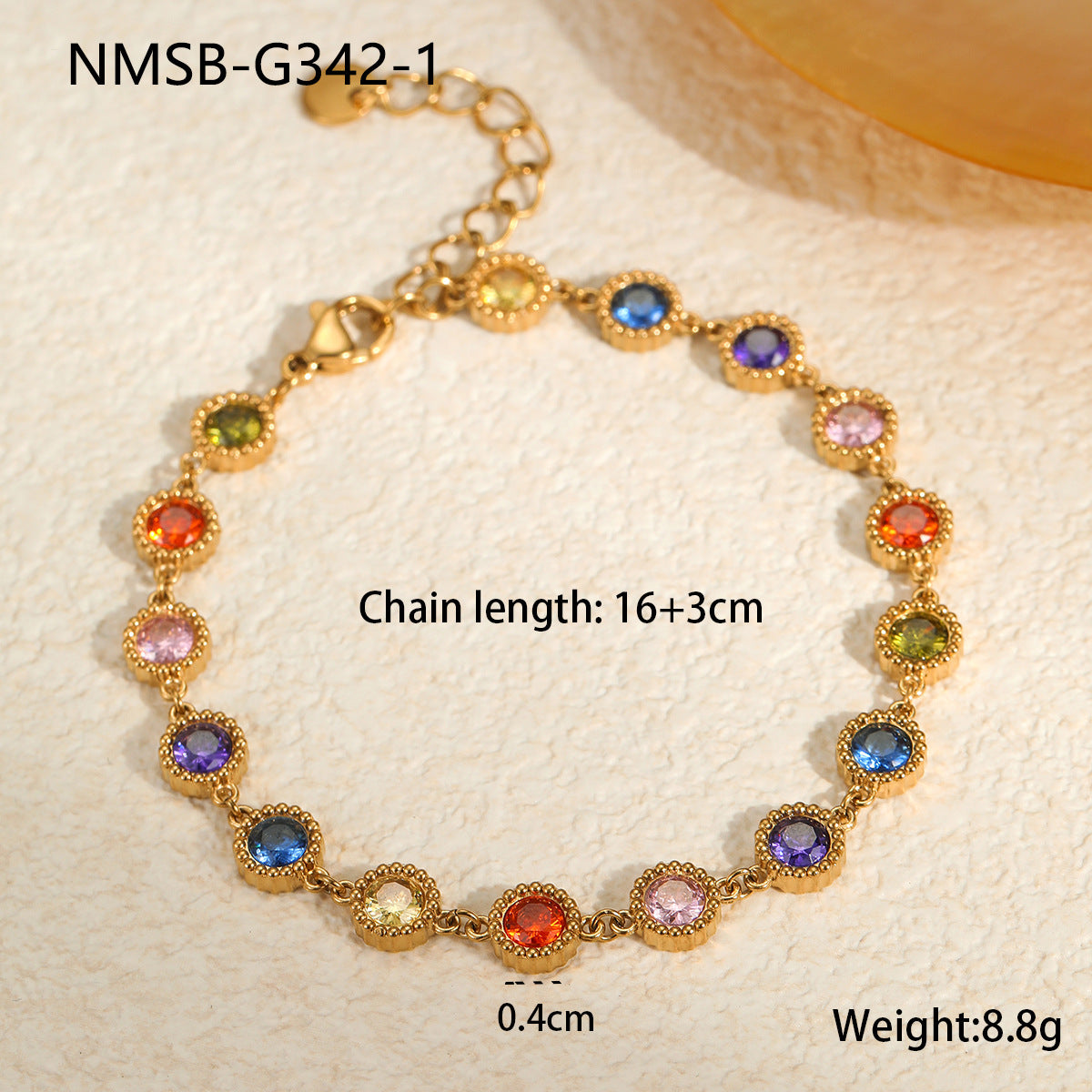 Braccialetto alla moda in acciaio al titanio geometrico da donna, con accenti di zirconi colorati e placcatura in oro 18K