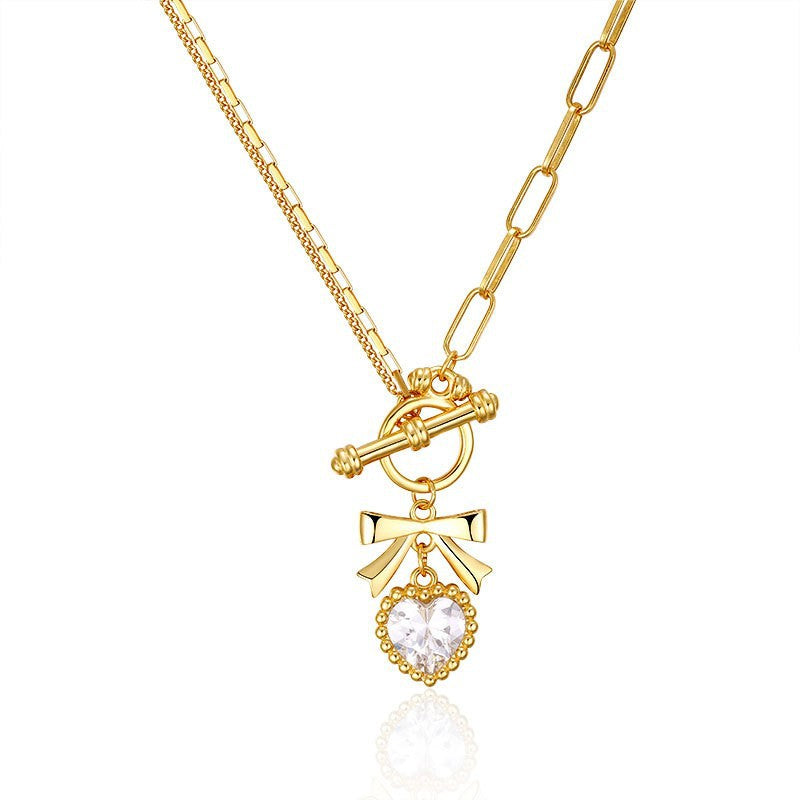 Collana minimalista con fiocco e cuore in argento sterling 925 con strass su catenina a maglie incrociate