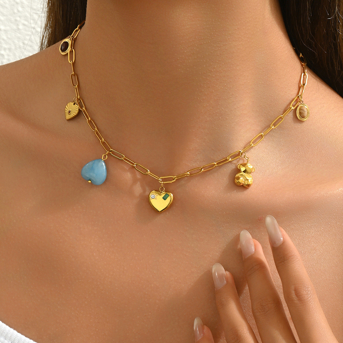 Collana a cuore geometrico in rame con intarsio di zirconi da donna, pendente lungo dal design minimalista e alla moda