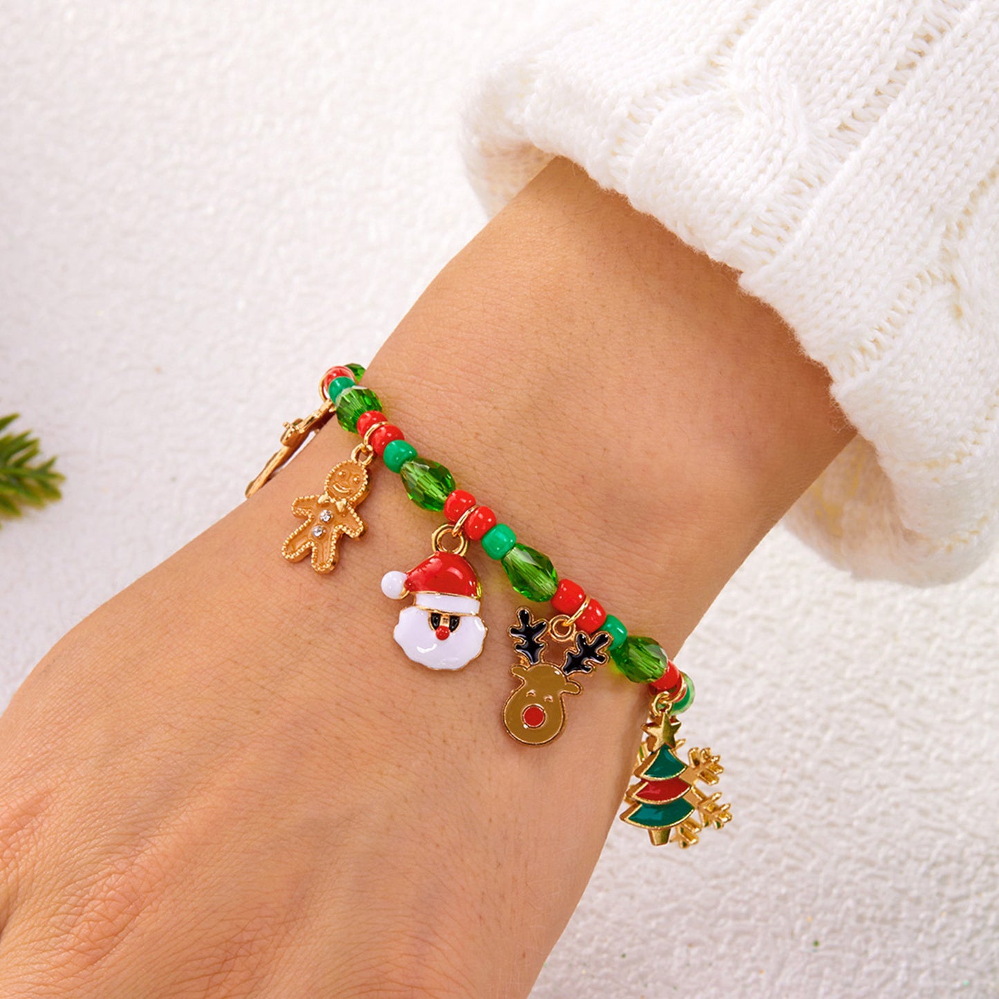Bracciale con ciondolo a fiocco di neve, renna e bastone di Babbo Natale in lega fatta a mano, con cristalli, gioiello natalizio per donna