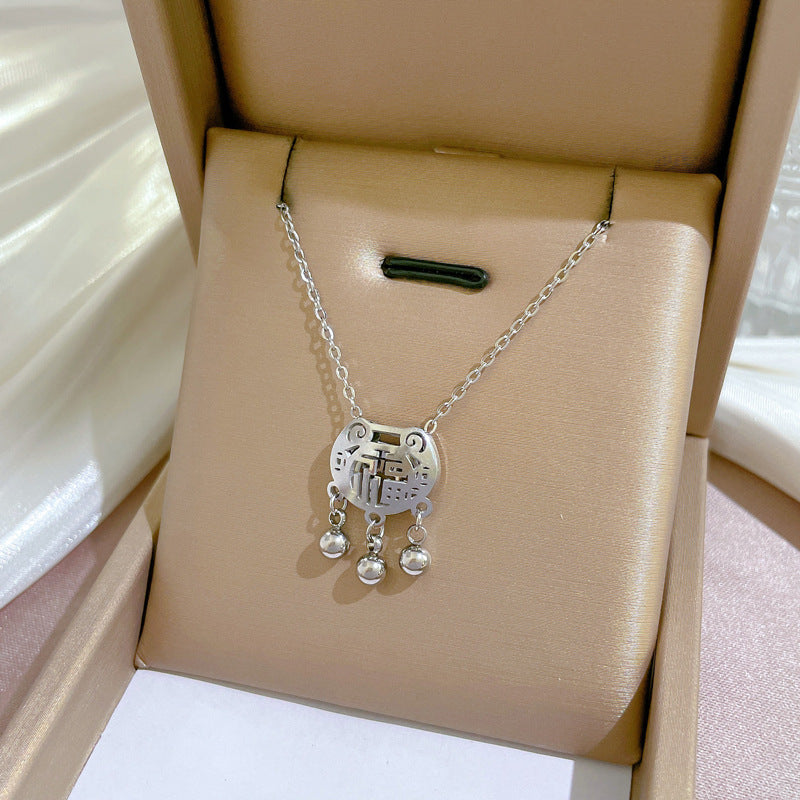 Collana con pendente geometrico minimalista in acciaio al titanio placcato per donna