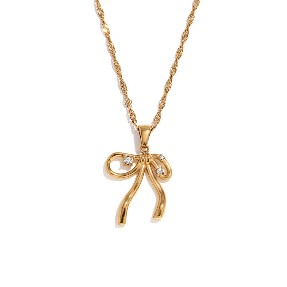 Collar de mujer de acero inoxidable chapado en oro de 18 quilates con forma de lazo de moda con detalles de diamantes de imitación