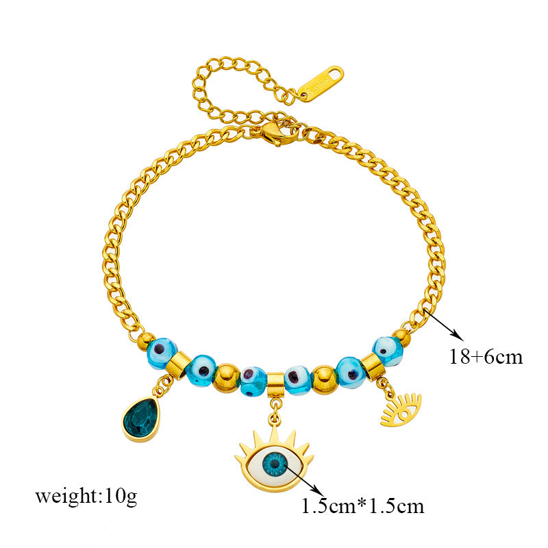 Bracciale alla moda con ciondolo a goccia asimmetrico a forma di occhio blu con perline in acciaio al titanio placcato per donne e uomini