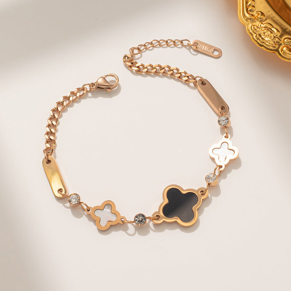 Pulsera geométrica de trébol de cuatro hojas de acero titanio con baño de oro rosa de 18K para mujer