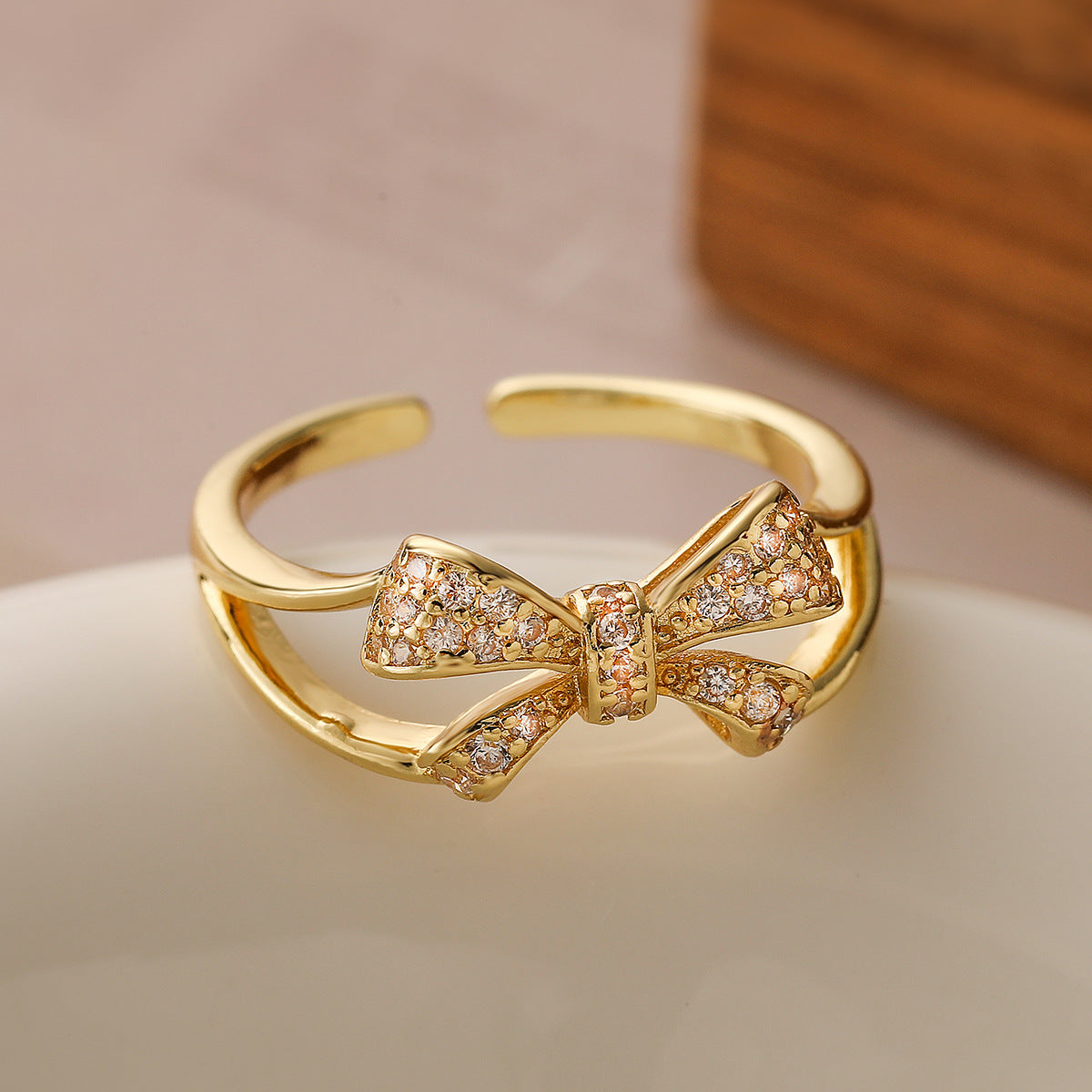 Sweet Style Geometric Bowknot Ring for Women Made of Brass with Real Gold Plating and Micro-Paved Zirconia