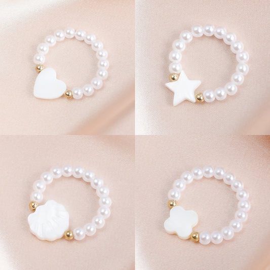 Anello Piccolo Dolce ed Audace in Perline Elastiche Effetto Perla con Ciondolo a Cuore in Madreperla in Metallo Placcato da Donna