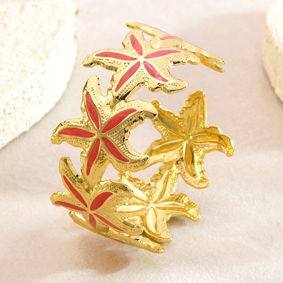 Elegante Bracciale a Polsino in Acciaio Inossidabile con Stella Marina e Goccia d'Olio