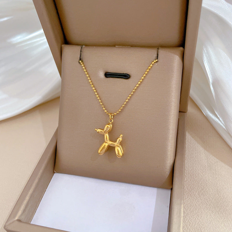 Collana con Ciondolo a Cane Geometrico Minimalista in Acciaio al Titanio per Donna e Uomo con Finitura Placcata Oro e Design a Catena Clavicolare
