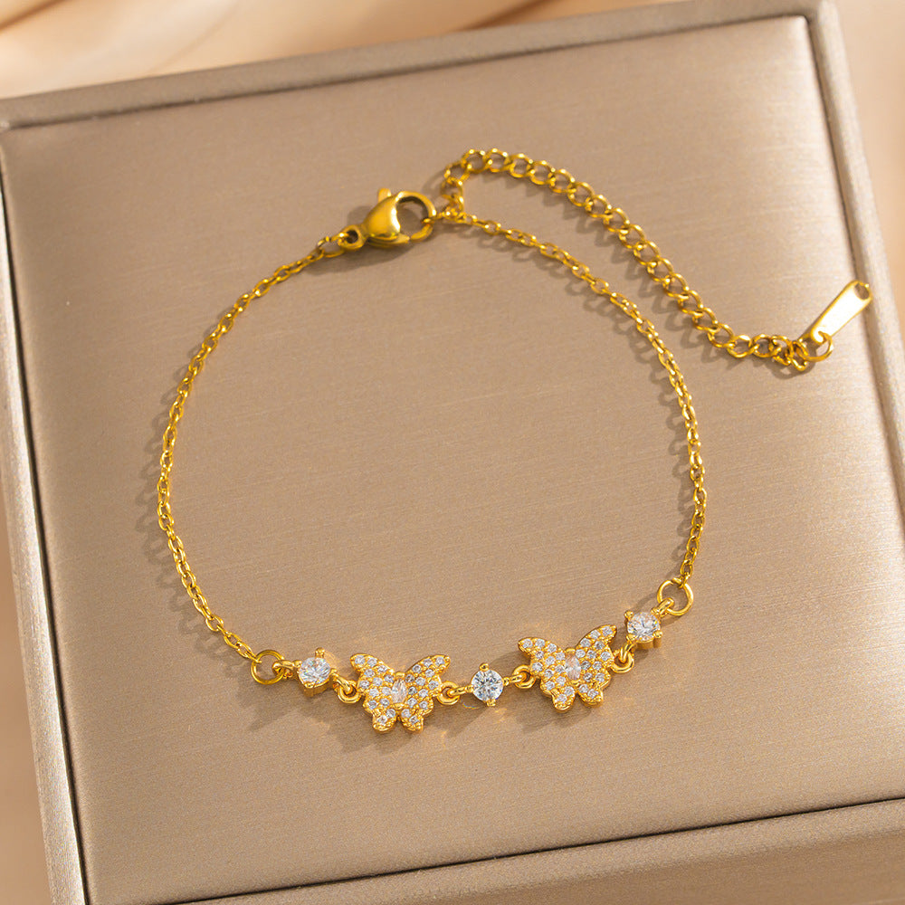 Bracciale vintage di lusso francese regolabile a forma di fiocco con intarsi in zircone e rame placcato in oro 18 carati