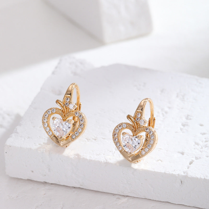 Pendientes minimalistas de corazón y estrella geométricos en cobre con postes de plata S925 e incrustaciones de circonita cúbica