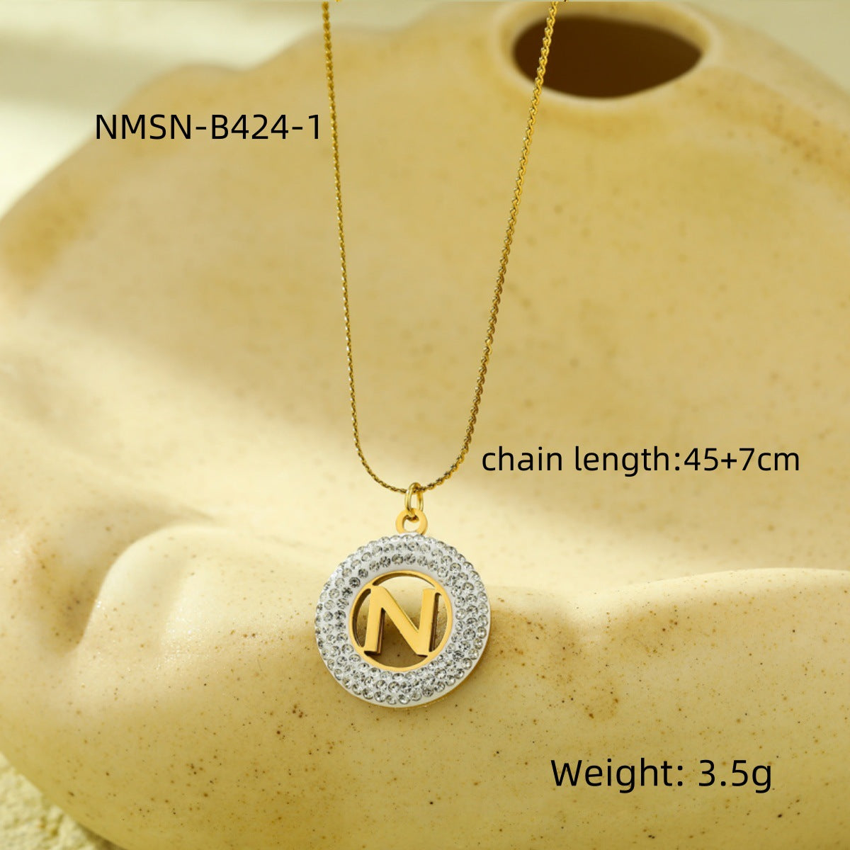 Collar con colgante de letra redonda hueca de acero inoxidable minimalista y moderno con incrustaciones de circonita para mujer