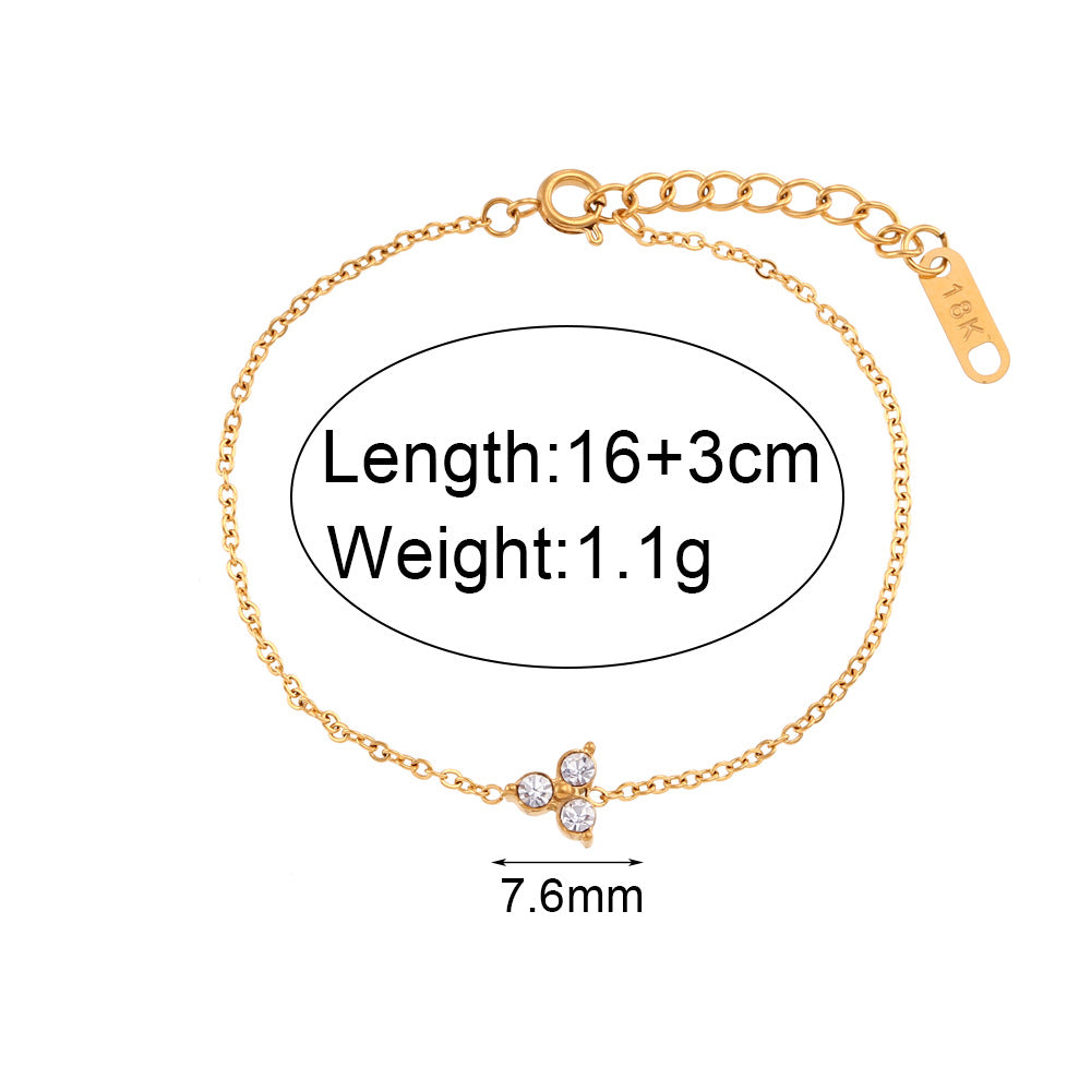 Elegante bracciale da donna placcato oro 18K in acciaio al titanio con strass a forma di fiore di loto