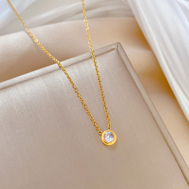 Collana girocollo minimalista in acciaio al titanio con strass, ciondolo floreale geometrico