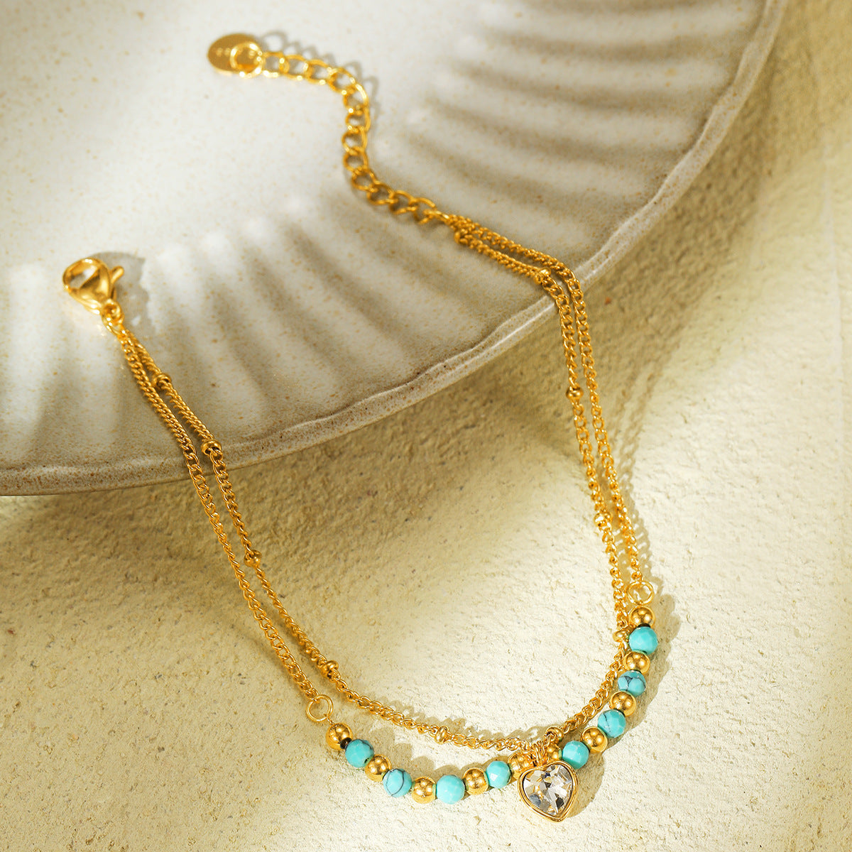 Elegante Bracciale da Donna a Cuore con Pietra Naturale Blu e Zirconi su Catena in Acciaio al Titanio