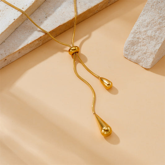 Set di Orecchini Pendenti a Goccia e Collana Minimalisti Retrò in Acciaio Inox da Donna con Motivo Cuore e Campanella Gioielli alla Moda per l'Ufficio e il Pendolarismo