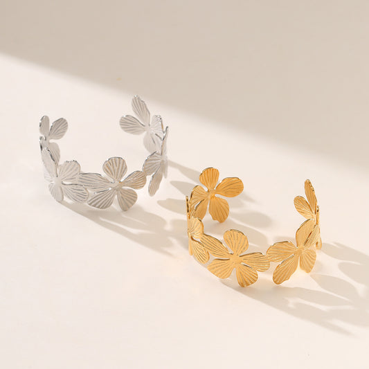 Pulsera de acero inoxidable chapado en oro de 18 quilates con pétalos de flores de moda para mujer