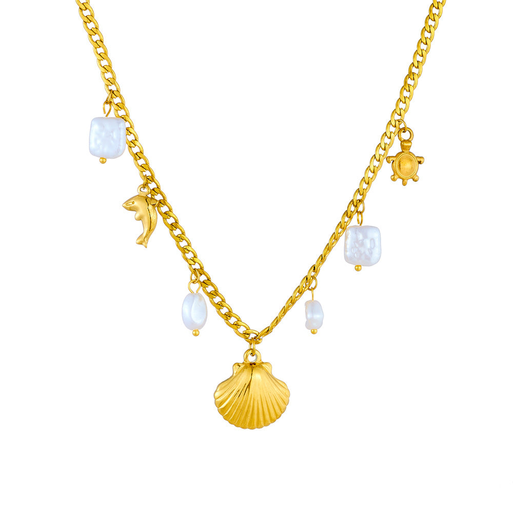 Collar con colgante moderno con diseño de océano, formas de delfín y tortuga en acero inoxidable con baño de oro en cadena de perfil lateral