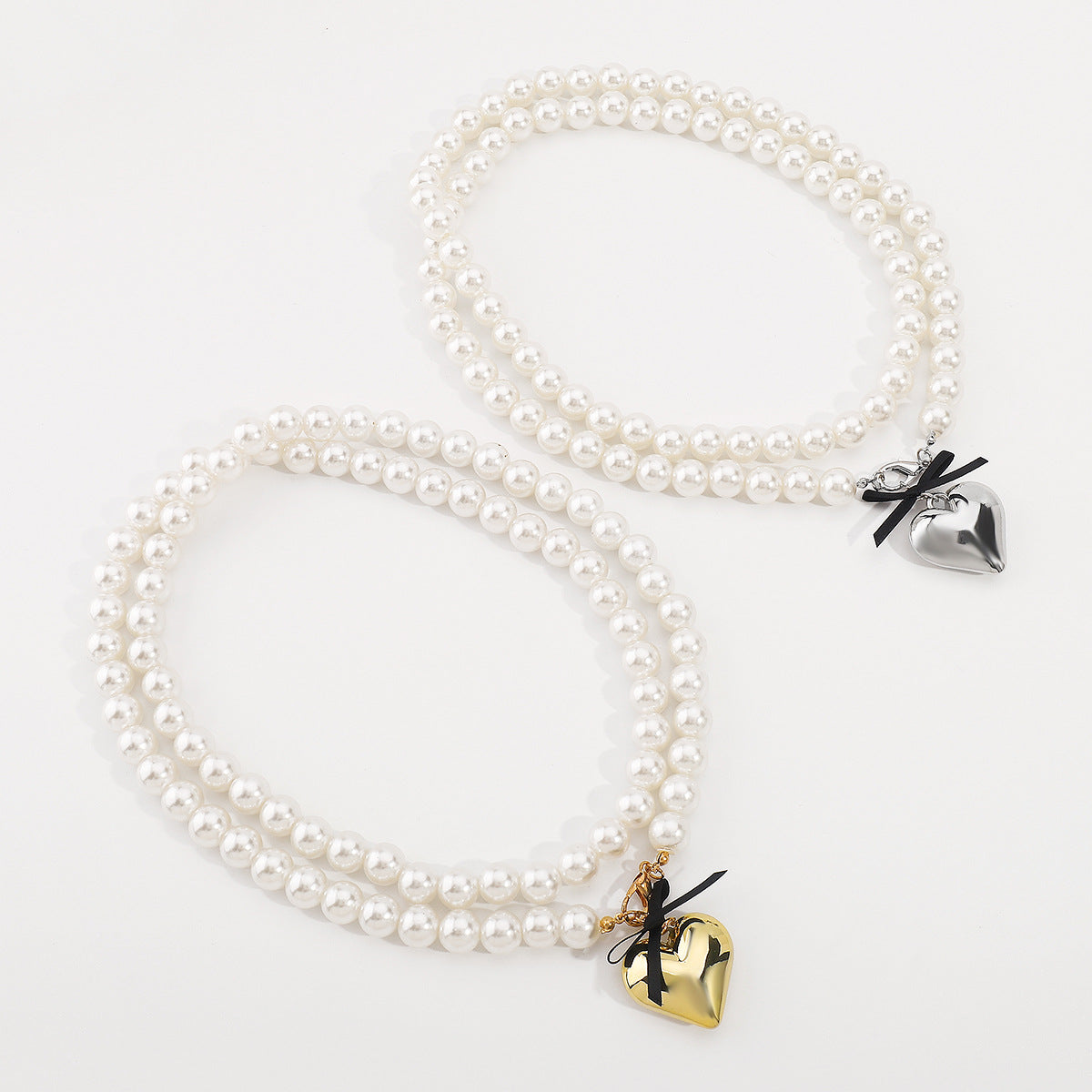 Dolce Collana con Fiocco a Nastro Minimalista a Cuore con Perla da Donna con Finitura Placcata e Delicata Catena per Clavicola