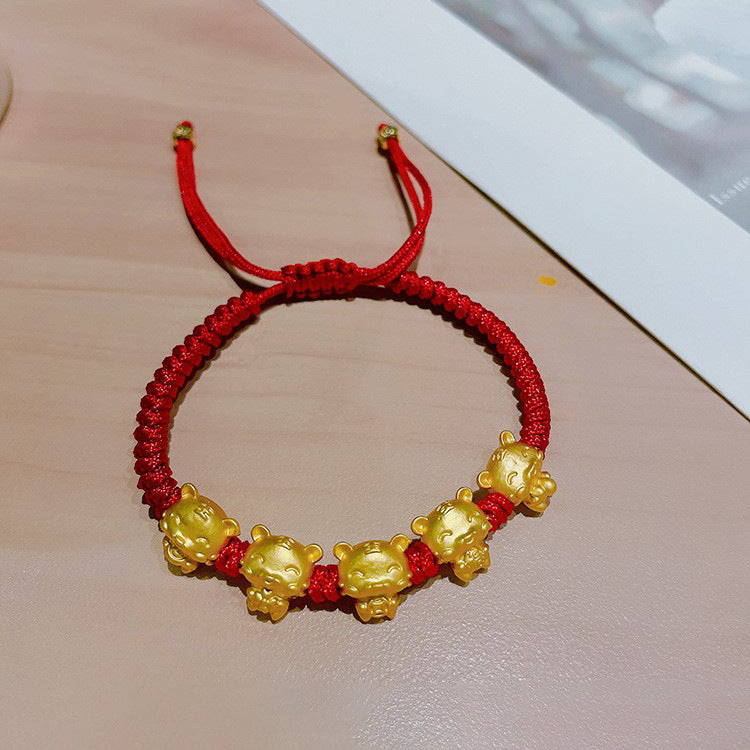 Braccialetto con ciondolo a tigre in stile cinese con cordino rosso intrecciato da uomo e da donna, con ciondolo in lega e finitura smaltata