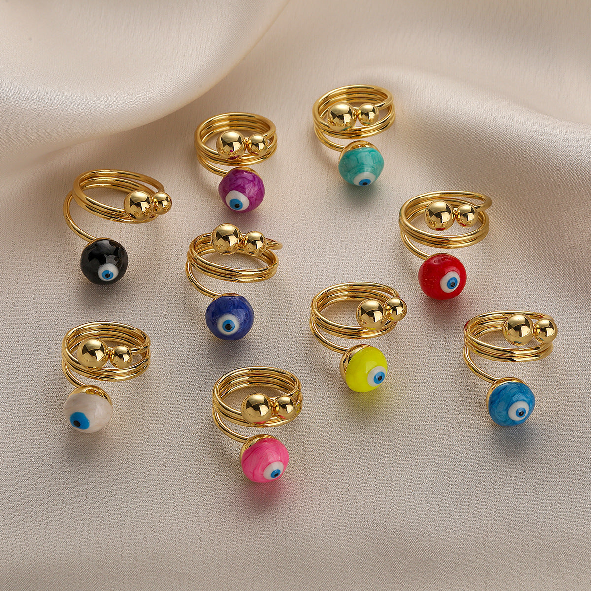 Anello Aperto Geometrico Minimalista da Donna Realizzato in Rame Placcato Oro con Design a Occhio di Allah in Smalto