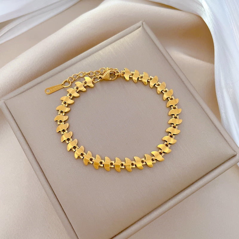 Minimalist Dart-Shaped Titanium Steel Bracelet for Women with Gold Plating and Wavy Texture