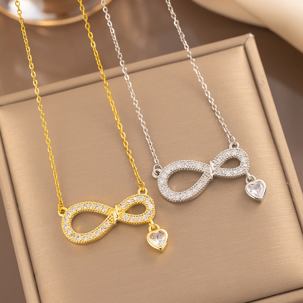 Collar de titanio minimalista con diseño de corazón en forma de ocho, microincrustaciones de circonia y colgante de cristal para mujer