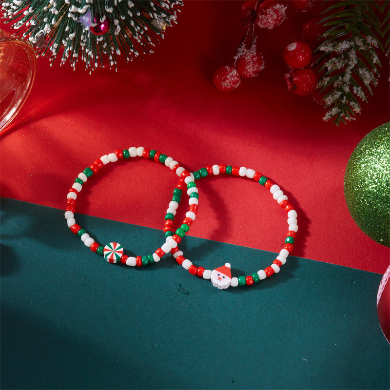 Set di bracciali natalizi fatti a mano in argilla polimerica con ciondoli a fiocco di neve e Babbo Natale per coppie